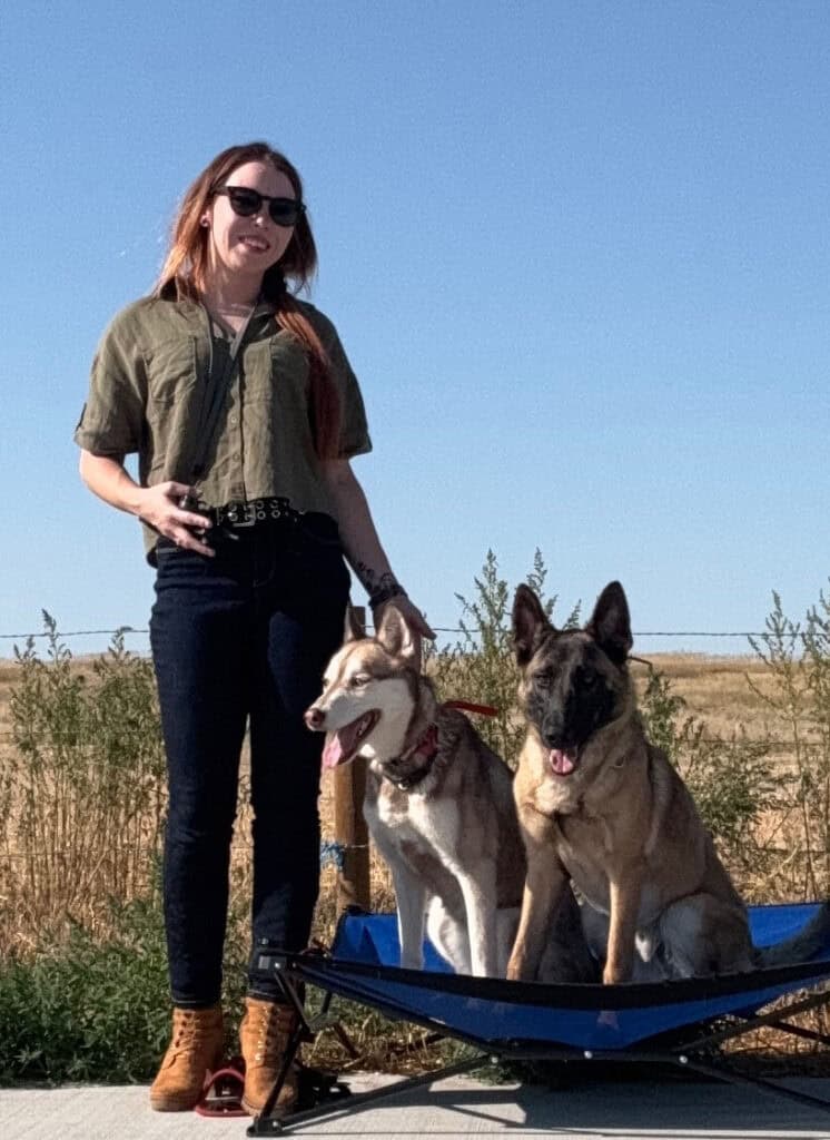 Ashley, expert dog trainer in Denver, CO, with her dog.
